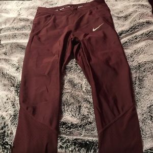 Super high waisted, burgundy Nike workout leggings